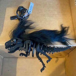 Coach T-rex bag charm